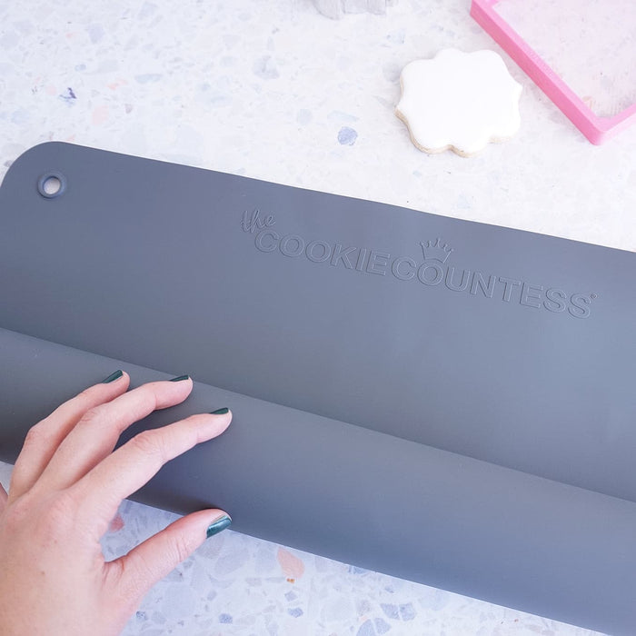 https://www.thecookiecountess.com/cdn/shop/files/the-cookie-countess-supplies-kitchen-counter-cover-silicone-36-x-22-inches-16538833977401_700x700.jpg?v=1699388399